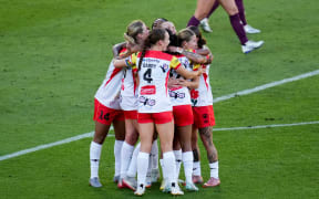 Wellington Phoenix players celebrate a goal during their A-League women's match against the Brisbane Roar in Wellington, 14 March 2026.  © Copyright image by Marty Melville / www.photosport.nz