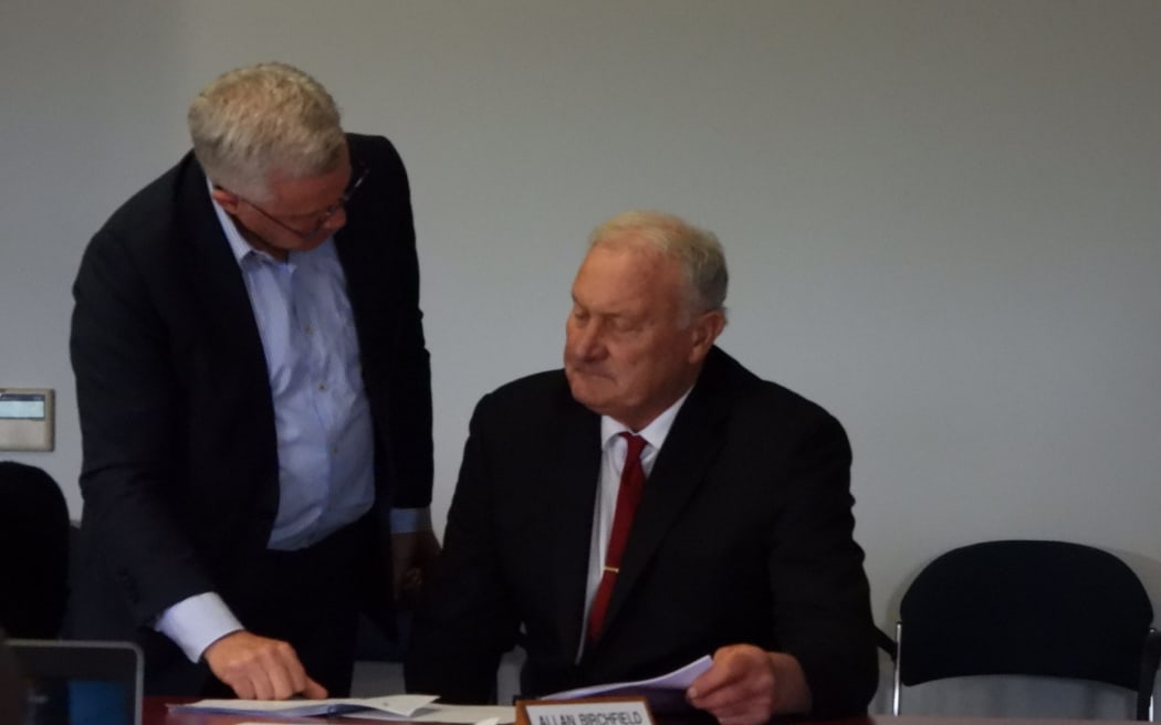 Frank Dooley (left) talks to Allan Birchfield about the rates issue at West Coast Regional Council, shortly before tensions flared.