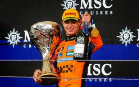 McLaren's Lando Norris celebrates his victory at the 2025 Sao Paulo Grand Prix, Brazil.