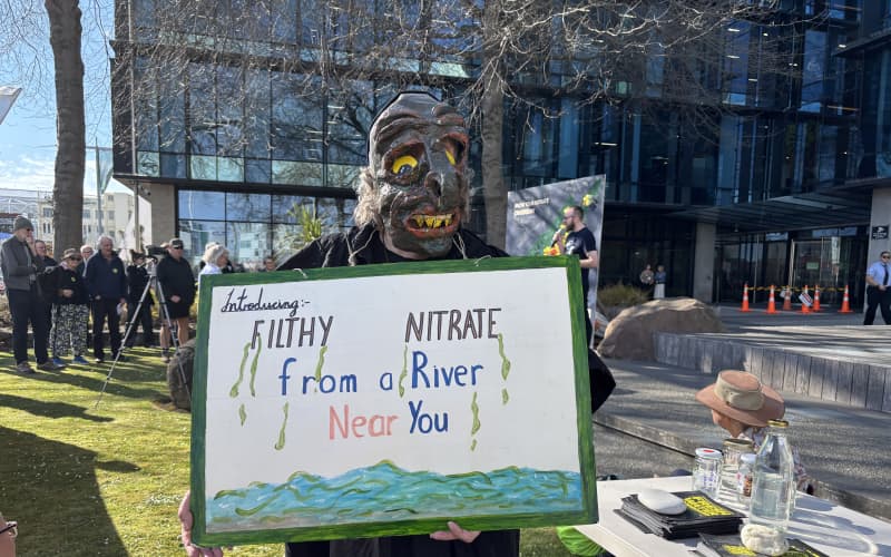 Protesters outside the Canterbury Regional Council offices demand action on nitrate levels.
