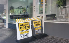Signs outside Bronson Jewellers in New Plymouth.