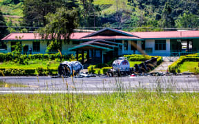 The remains of an Air Niugini airplane, destroyed by an angry mob at Mendi airport in June, have now been moved off the runway.