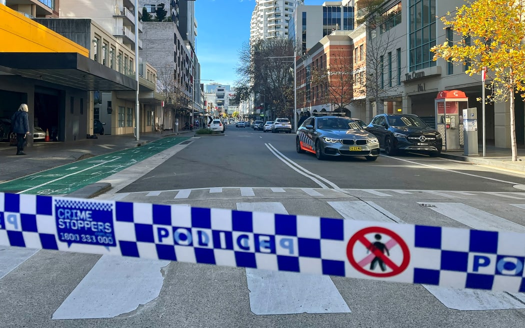 Police block off a street at Bondi Junction, an eastern suburb of Sydney on 27 June, 2023 after a shooting incident.