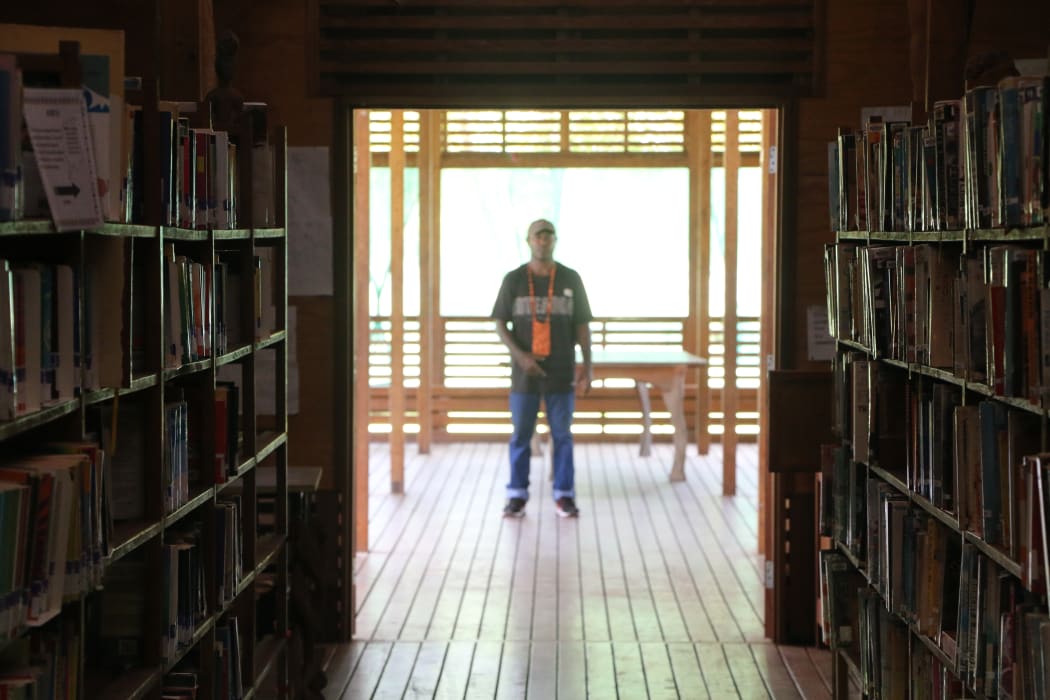 Allan Gioni, the manager of Haus Stori in Arawa, Bougainville, at the library.