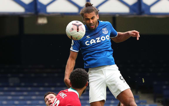Everton's English striker Dominic Calvert-Lewin scores his team's second goal during the English Premier League football match between Everton and Liverpool at Goodison Park in Liverpool on October 17, 2020.