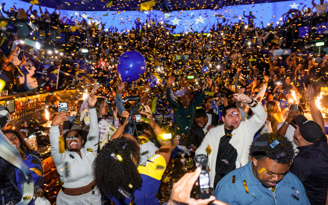 ROTTERDAM - Curaçao football fans watch the final qualifying match for the FIFA World Cup in a Rotterdam cafe. ANP MARCO VAN DER CAAIJ netherlands out - belgium out (Photo by Marco van der Caaij / ANP MAG / ANP via AFP)