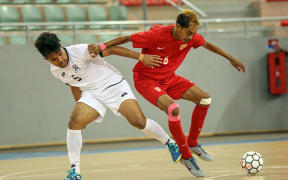 Tonga's Soakai Vea (Left) and Tahiti's Olivier Hirihiri go after the ball. OFC Futsal Nations Cup 2019