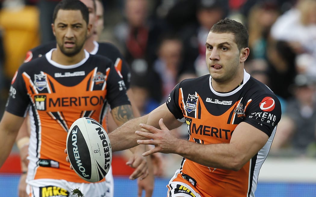 Wests Tigers Robbie Farah with now former team-mate Benji Marshall playing against the NZ Warriors at Mt Smart Stadium, Auckland on Sunday 12 June 2011. Photo: Simon Watts / photosport.co.nz