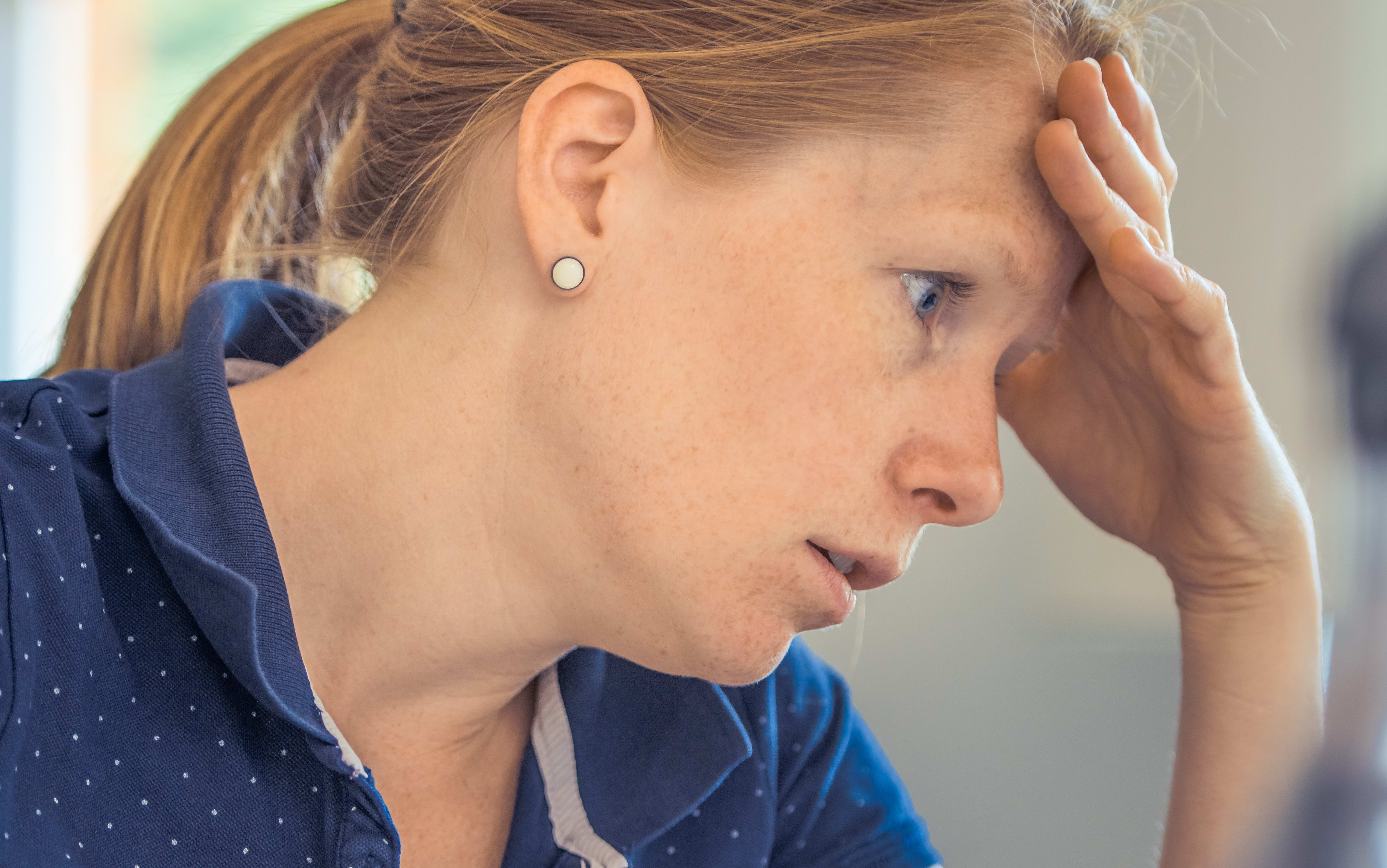 tired woman at computer