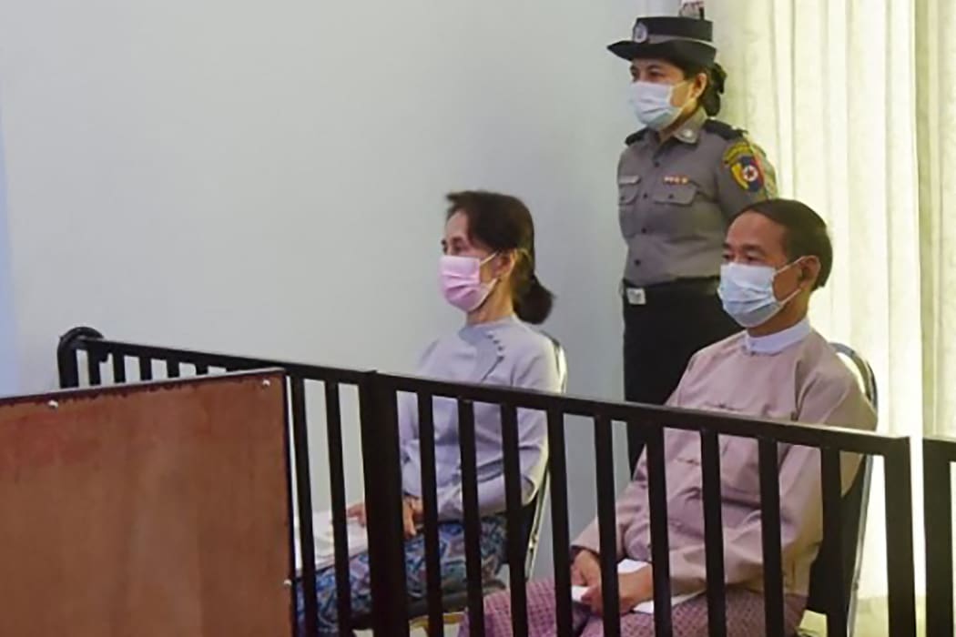 Aung San Suu Kyi (left) and Win Myint (right) during their first court appearance in Naypyidaw on 24 May, 2021, since the military detained them in a coup on 1 February.