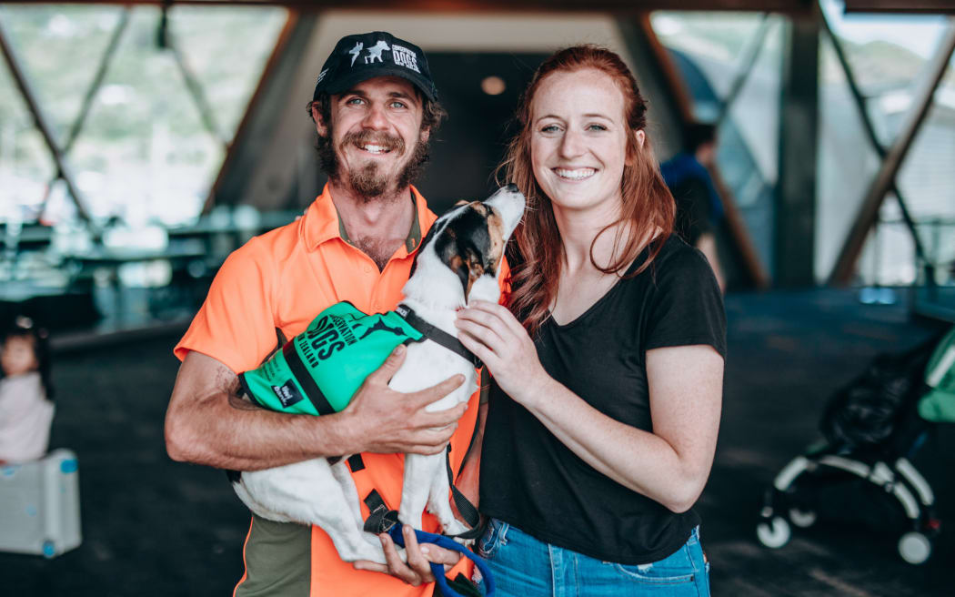 Richard Johnston and his partner Elizabeth McDonald with Flint the conservation dog.