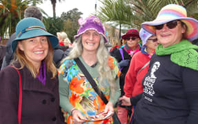 Kate Fulton, Debs Martin and Lulu Purda getting ready to walk in the Suffrage Day march in Nelson today.