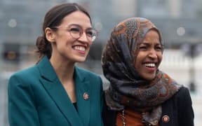 File photo of Representative Alexandria Ocasio-Cortez, and Ilhan Omar (R) - two of the members of Congress President Trump has attacked.