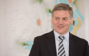 Bill English at a social housing announcement in Northcote