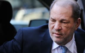 Harvey Weinstein enters a Manhattan court house as a jury continues with deliberations in his trial on 24 February 2020.