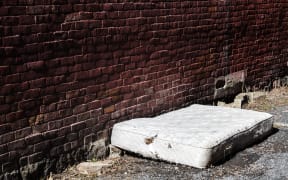 Old and dirty Abandoned Mattress in a Backstreet homeless homelessness