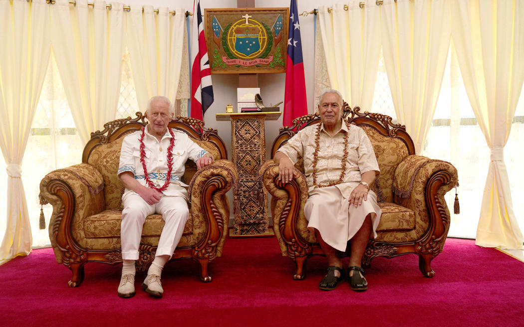 Britain's King Charles III (L) meets with Head of State of the Independent State of Samoa Afioga Tuimaleali?ifano Va?aleto?a Eti Sualauvi II at his official residence in Apia on October 24, 2024. (Photo by Aaron Chown / POOL / AFP)