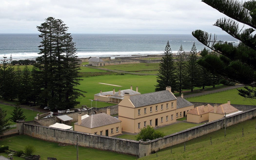 The former military barracks in Kingston in the Australian territory of Norfolk Island, 03 February 2007, are where New Zealander Glenn McNeill is standing trial for the murder of Australian woman Janelle Patton in 2002. In the backround are the ruins of the former British penal settlement on the island, which was later settled by the descendants of the famous mutiny on the 'Bounty'.  AFP PHOTO/Lawrence BARTLETT (Photo by LAWRENCE BARTLETT / AFP)