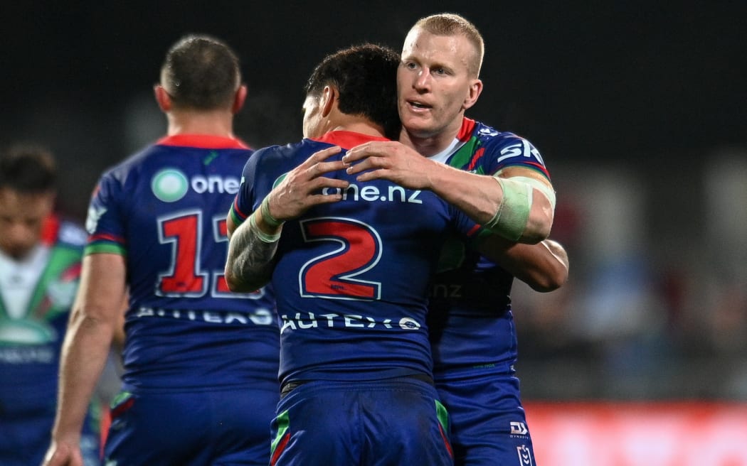Taine Tuaupiki of the Warriors and Mitchell Barnett of the Warriors celebrate winning the NRL Telstra Premiership, Warriors Vs Knights.