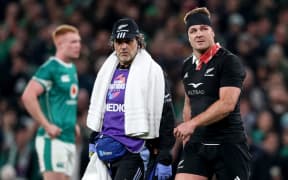 All Blacks loose forward Sam Cane leaves the field against Ireland.