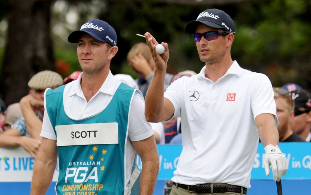 Australian golfer Adam Scott (R) with new caddie Mike Kerr.