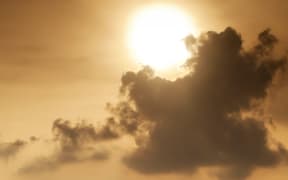 A file photo shows smog above a town.