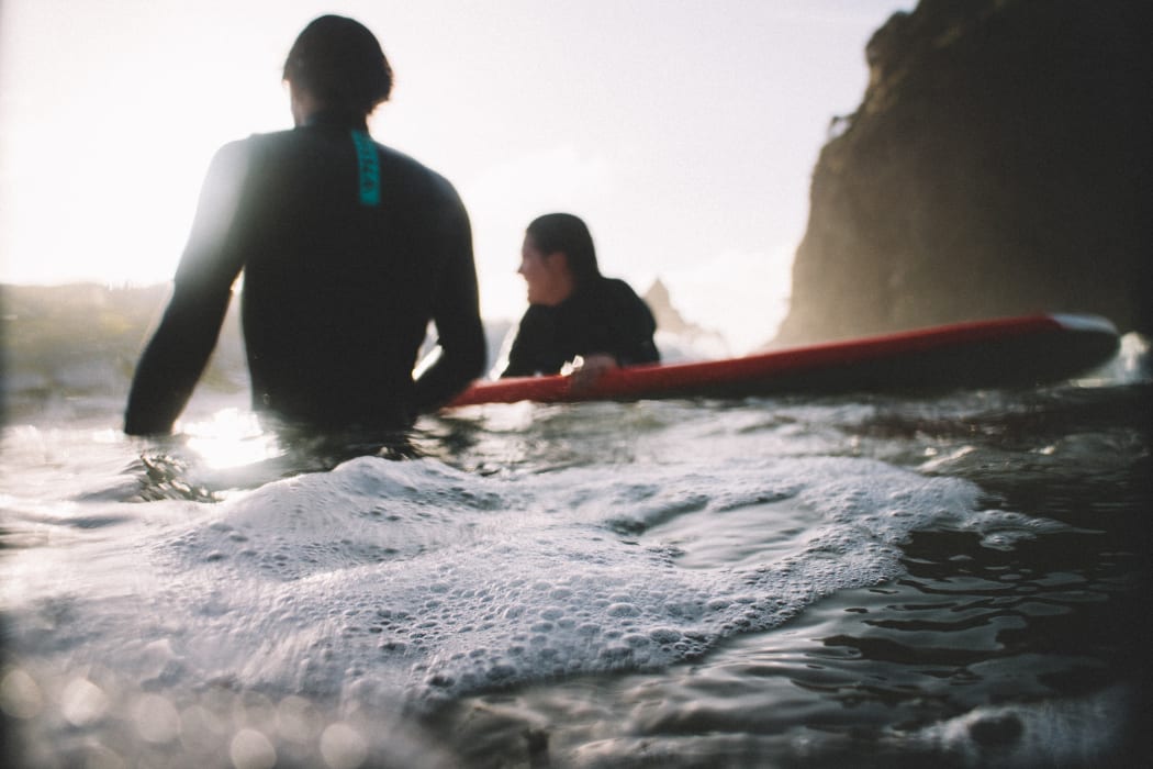 Relaxing surfers at Piha Beach (Unsplash).jpg

Tim Marshall timmarshall, CC0, via Wikimedia Commons