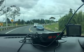 John Campbell joins police while they monitor drivers on New Zealand's worst road.