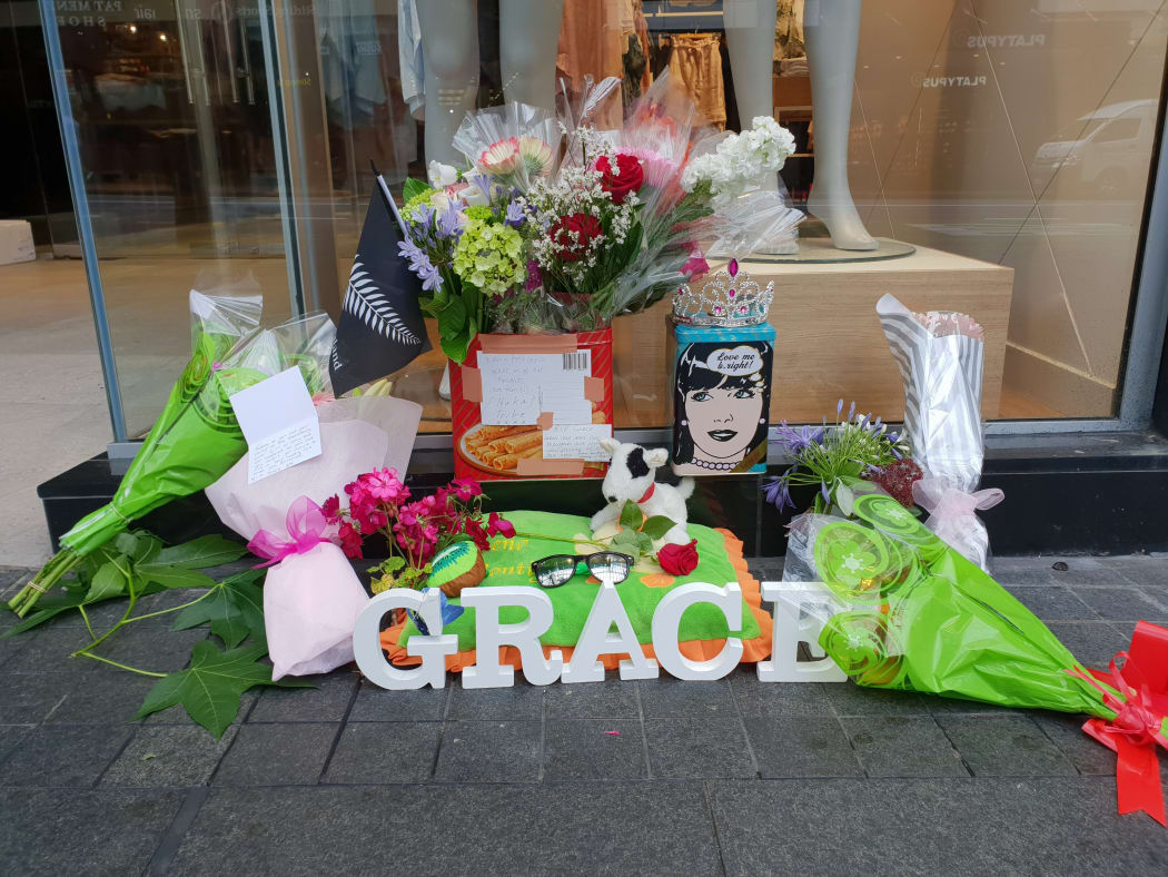 Tributes are left outside City Life Hotel, where the last sighting of British backpacker Grace Millane was.