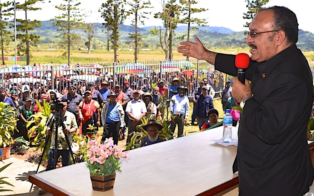 Papua New Guinea's Prime Minister Peter O'Neill speaks to the public.