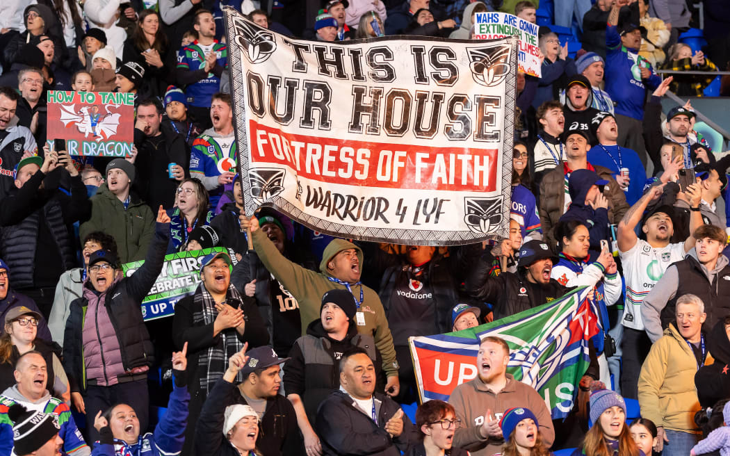 Warriors faithful celebrate the win after the Round 24 of the NRL Premiership rugby league match - NZ Warriors v Dragons.
