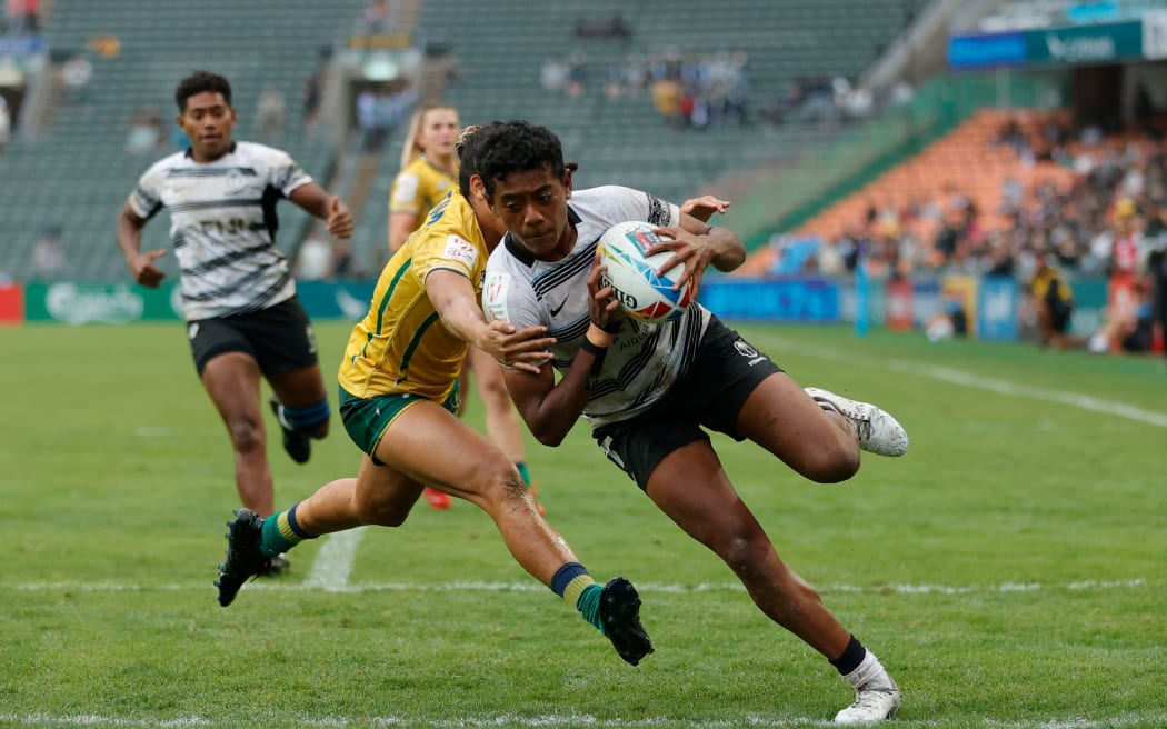 Fiji's Meredani Qoro scores a try against Brazil on day one of the Cathay/ HSBC Hong Kong Sevens at Hong Kong Stadium on 31 March, 2023 in Hong Kong.