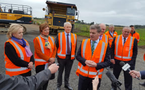 Government Minister Anne Tolley, Auckland Mayor Phil Goff, Prime Minister Bill English, Finance Minister Steven Joyce, and Auckland Deputy Mayor Bill Cashmore.