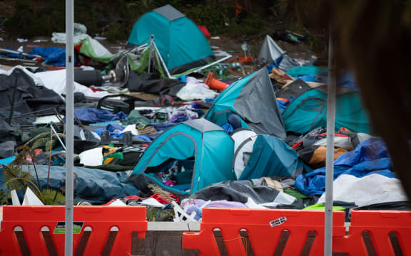 Tents and rubbish litter Parliament grounds after clashes between police and protesters yesterday.