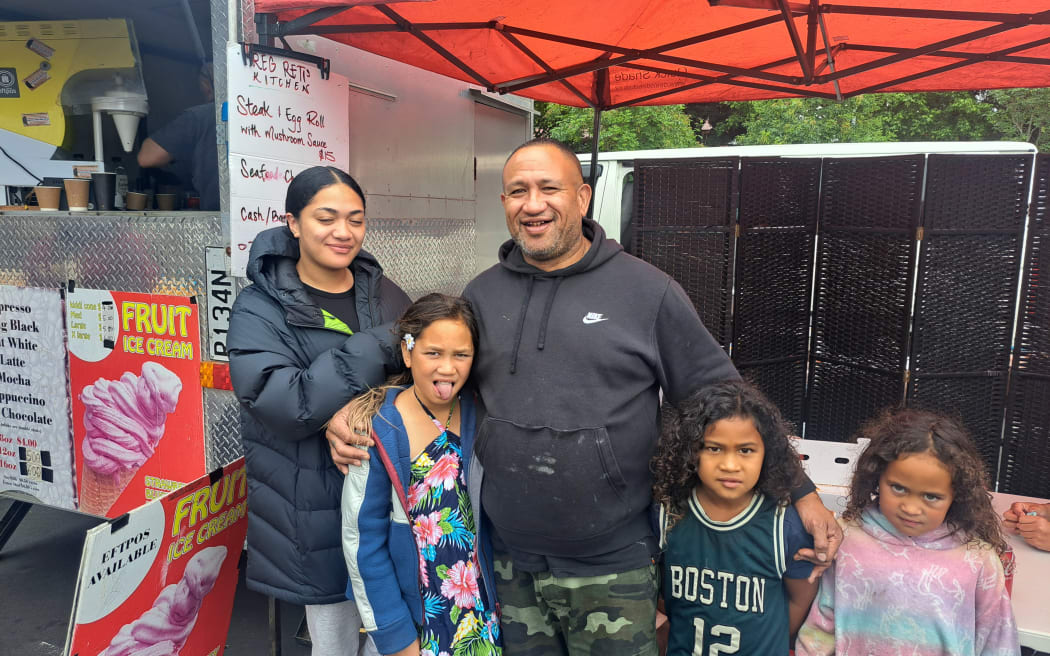 Reginald Reti sells steak and egg rolls from his stall at the Otara Market.