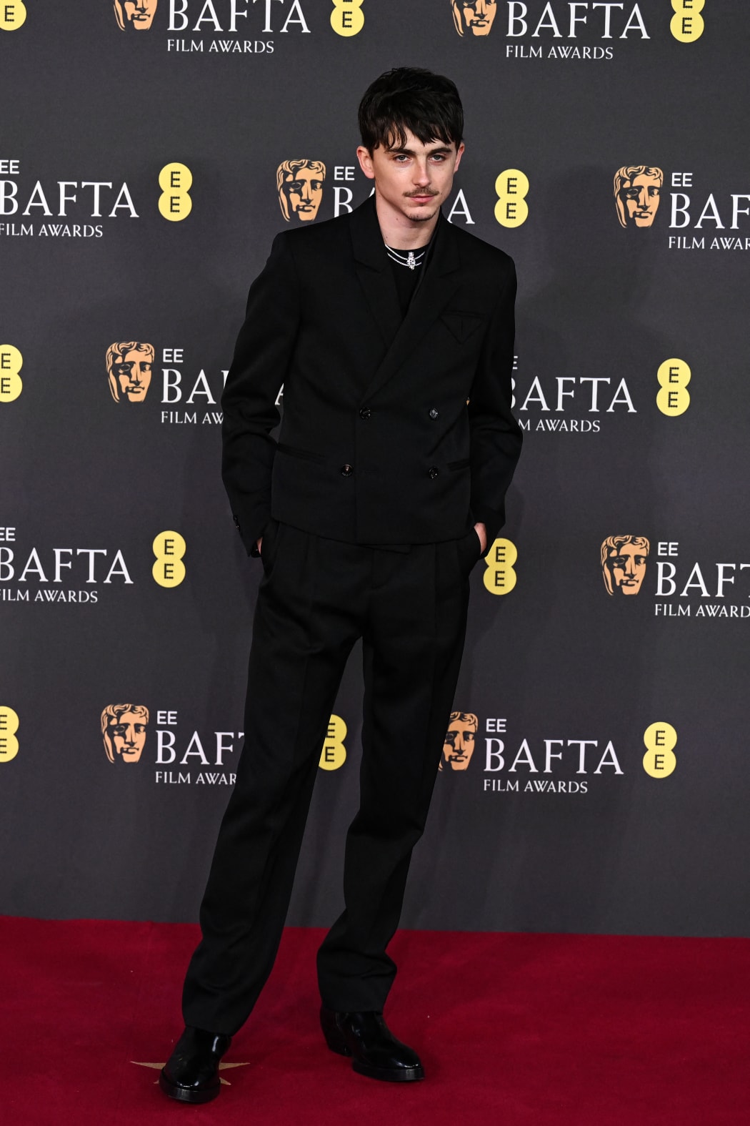 French-US actor Timothée Chalamet poses on the red carpet upon arrival at the BAFTA British Academy Film Awards at the Royal Festival Hall, Southbank Centre, in London, on February 16, 2025.