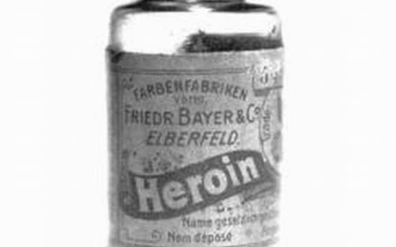 An image of a small jar of heroin, available for commercial sale.