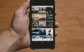 social media on smartphone. Android. holding smartphone.