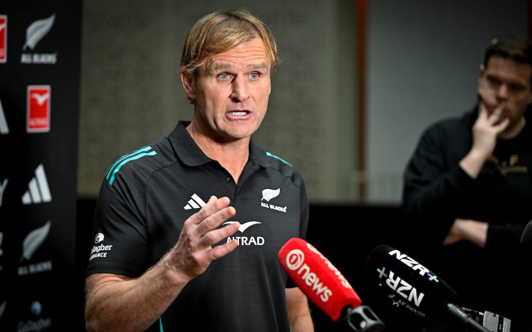 Scott Robertson speaks to media.