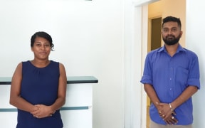 Dr Ashank Jyotish Naidu, (right), with a staff member at his medical clinic