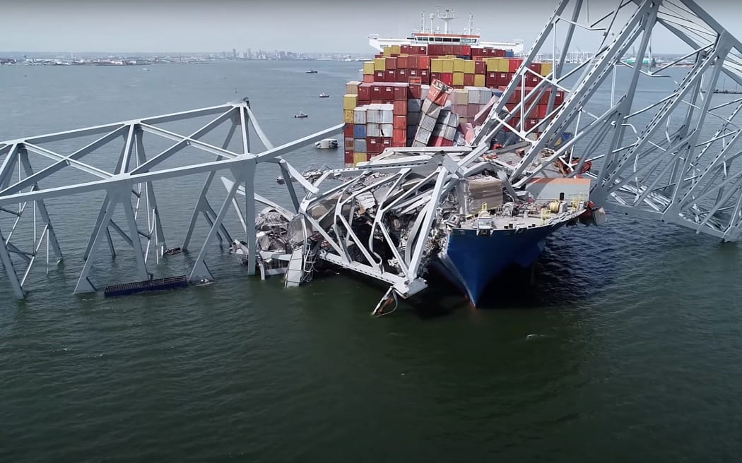 Two bodies recovered as divers search river after ship hit Baltimore bridge