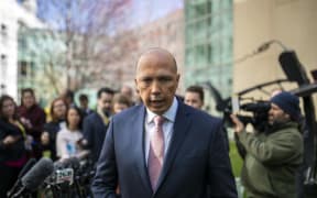 Australia's former home affairs minister, Peter Dutton, faces the media at a press conference in Canberra on August 21, 2018.