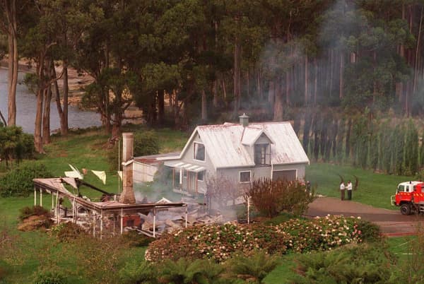 The burnt-out structure of a rural guesthouse.