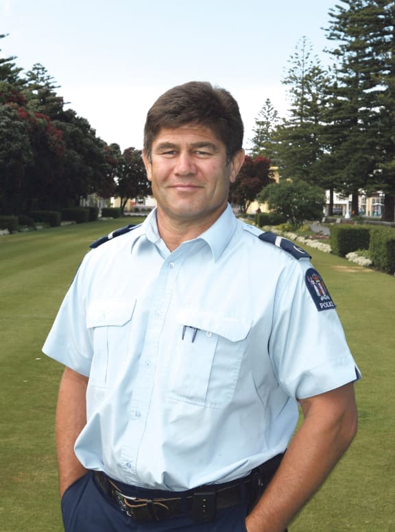 A portrait of Senior Constable Len Snee.