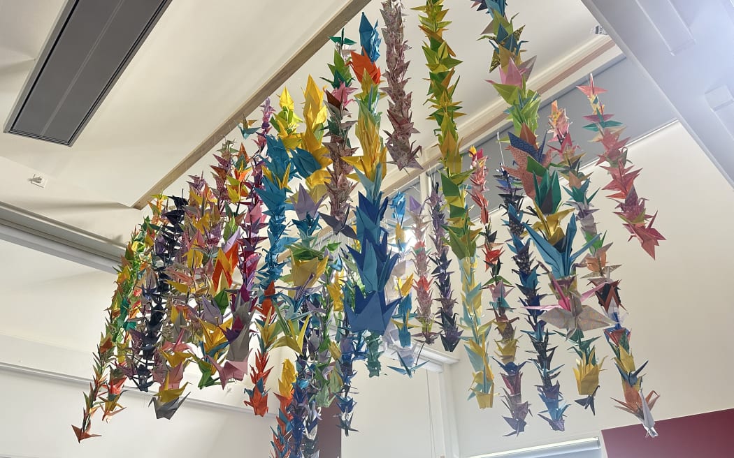 Takapuna Grammar School students folded origami cranes and hung them around Hu’s classroom to honor his passing.