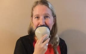 Audio Descripber Nicola Owen talks into a stenomask.