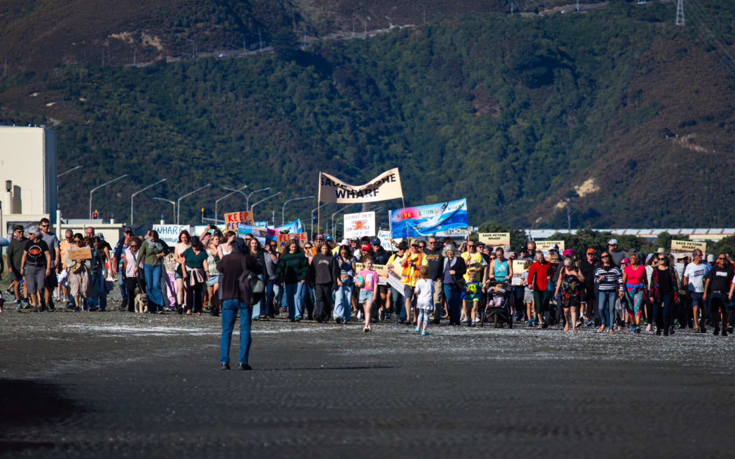 A community walk protesting plans to demolish Petone Wharf on 28 April 2024.