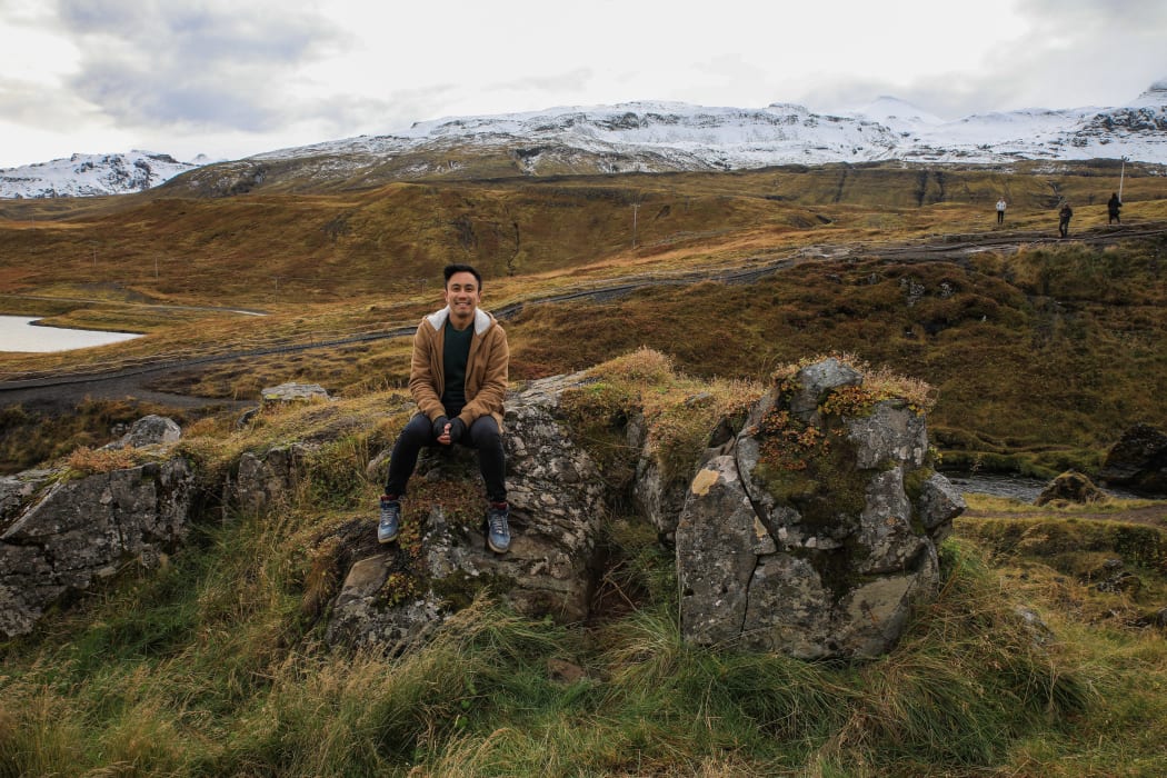 Chris Tse at Kirkjufellsfoss, outside Grundarfjörður in the Westfjords region, Iceland.