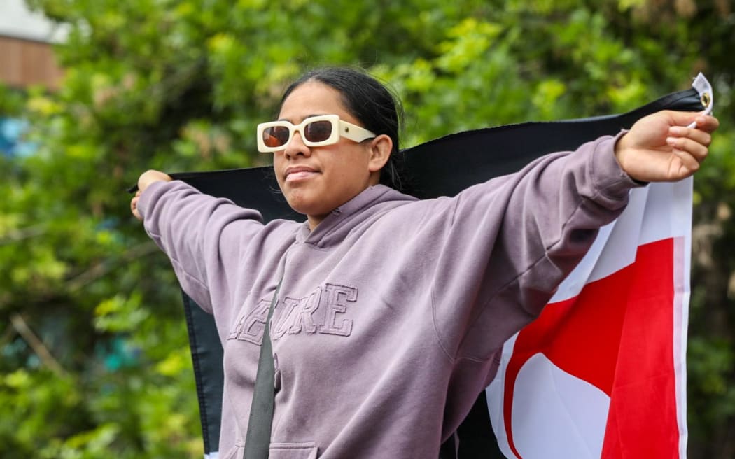 Supporters of the hīkoi rally at the Bridge of Remembrance in Christchurch on 13 November 2024.