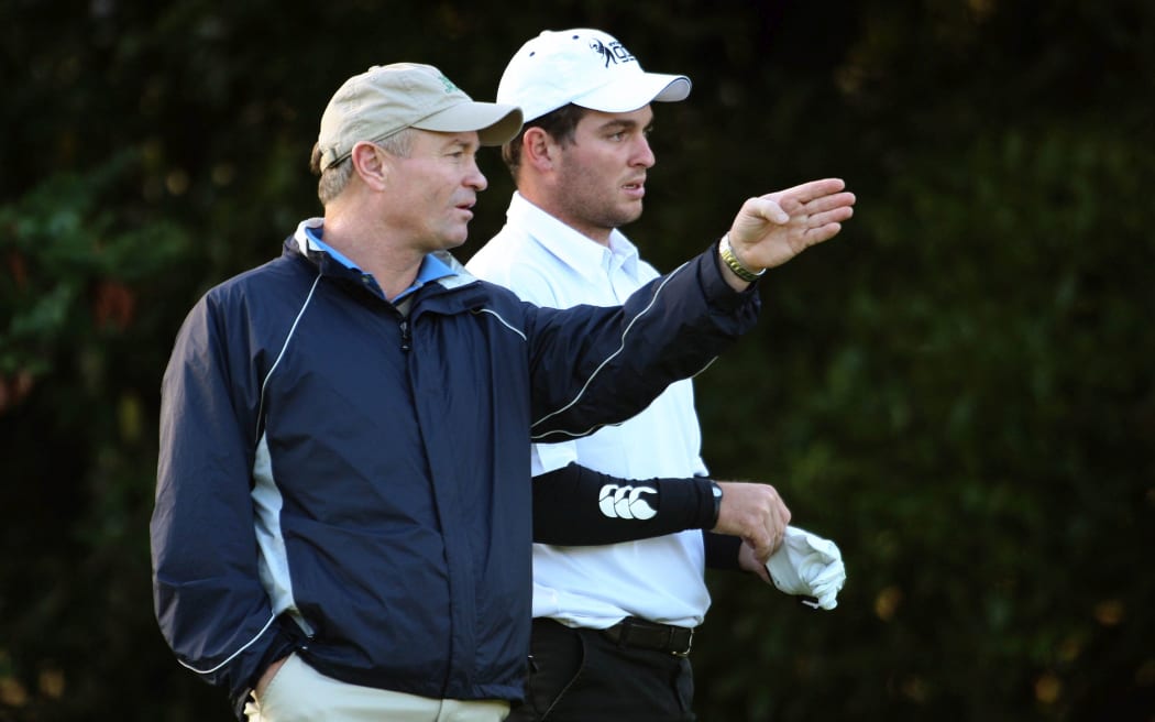 Ryan Fox taking advice from cadd/father Grant Fox at the trans-Tasman Cup
